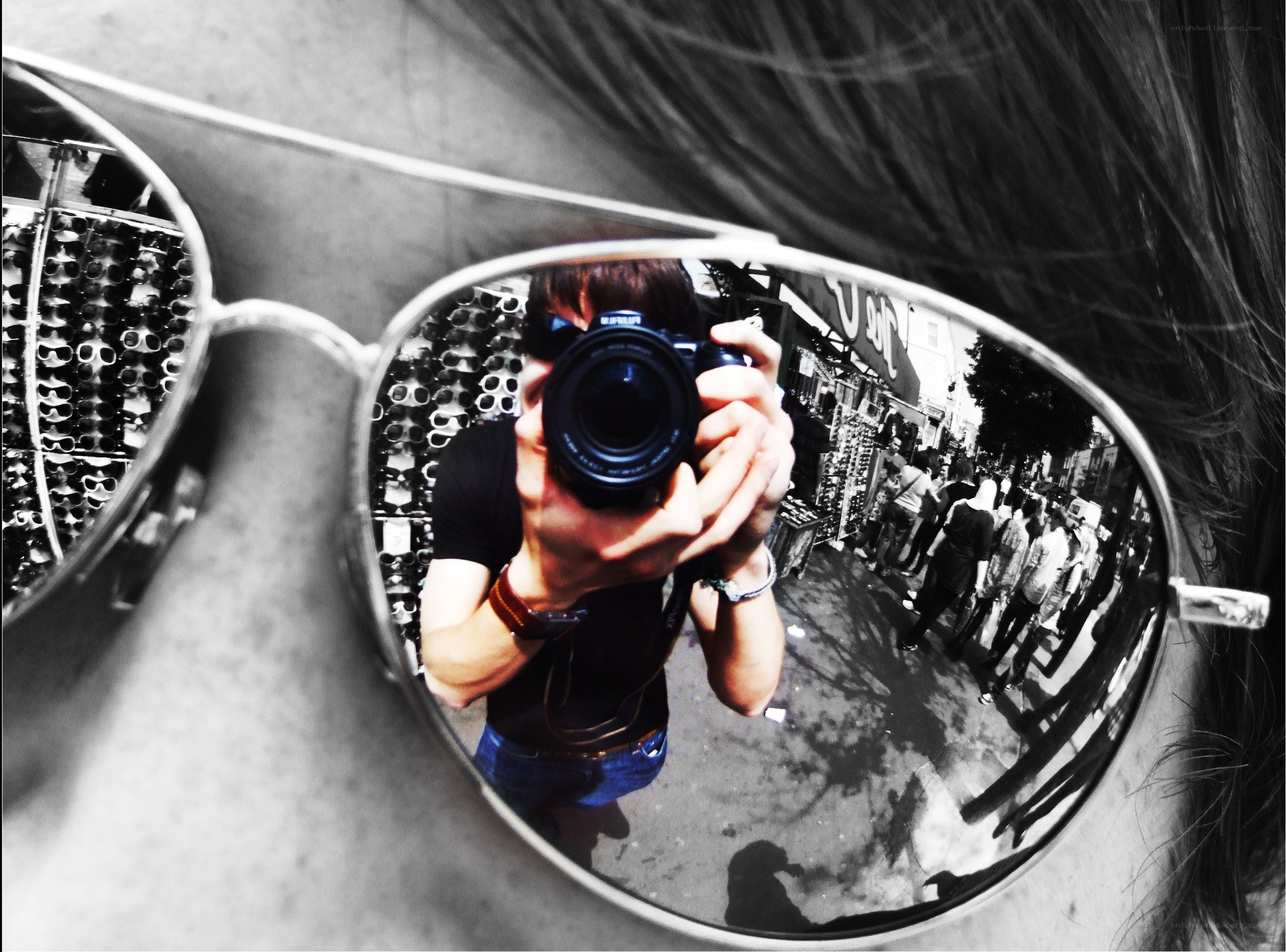 Selfie in sunglasses mirror