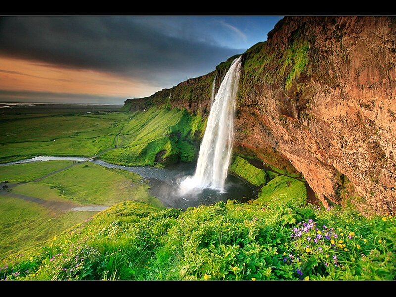Seljalandsfoss Waterfall — Green, Dramatic, Sunset, Photograph, Cliff, River, Grass