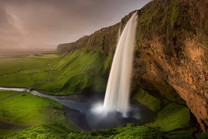 Seljalandsfoss Waterfall — Green, Dramatic, Sunset