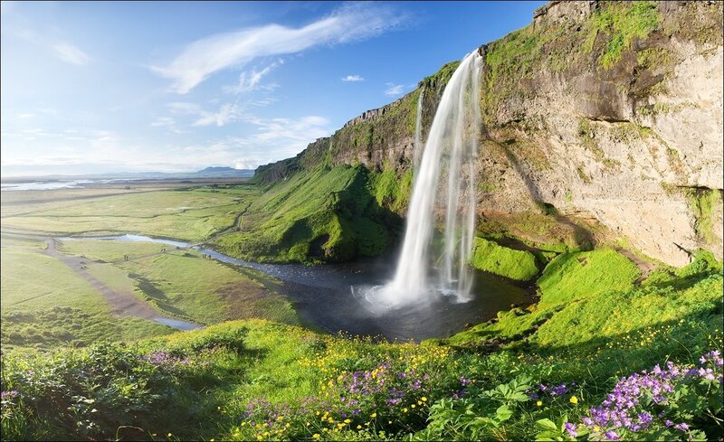 Seljalandsfoss Waterfall — Green, Serene, Afternoon, Photograph, River, Cliff, Flowers
