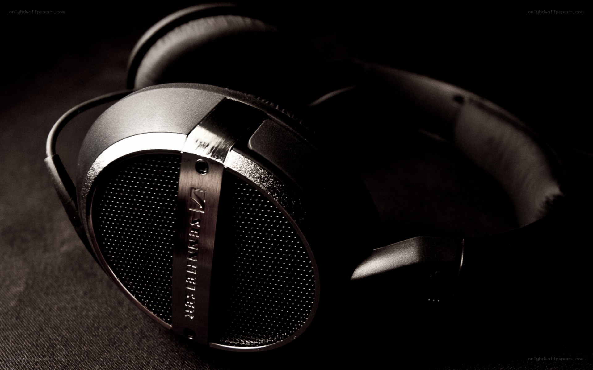 Sennheiser headphones on dark surface