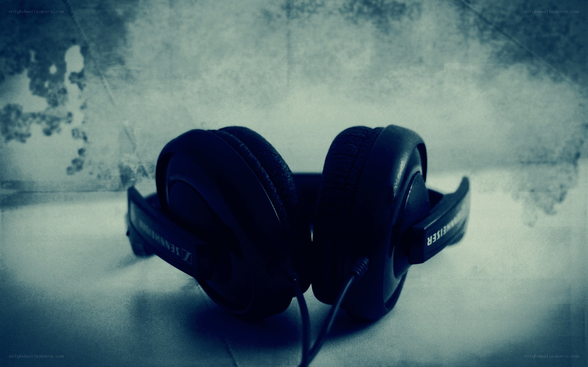 Sennheiser headphones on textured surface