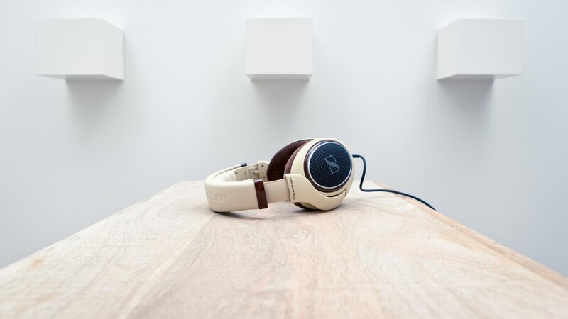 Sennheiser headphones on wooden table