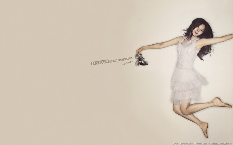 Seohyun jumping in white dress