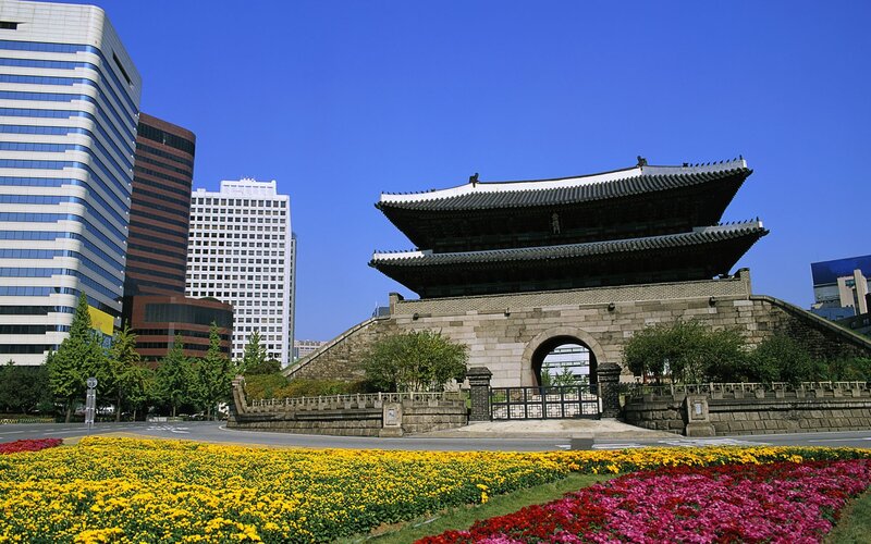 Seoul city gate with modern buildings