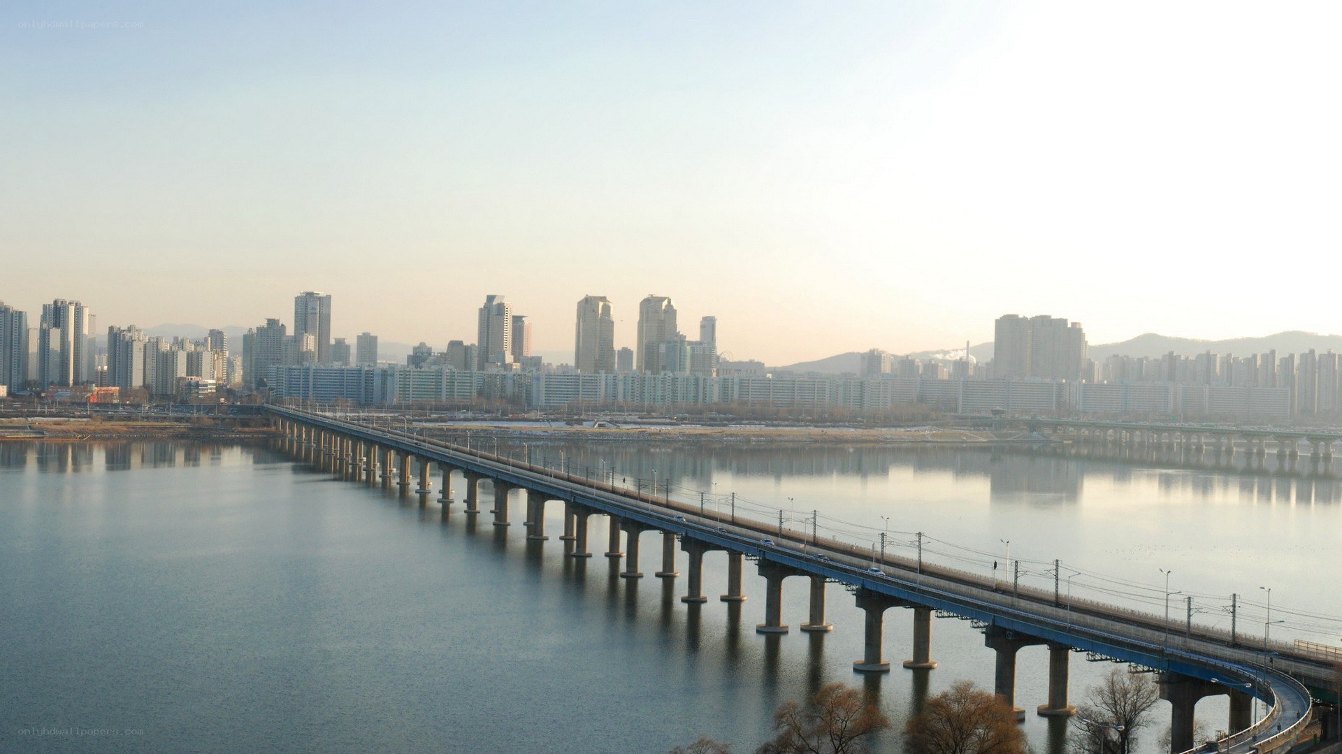 Seoul cityscape with river bridge
