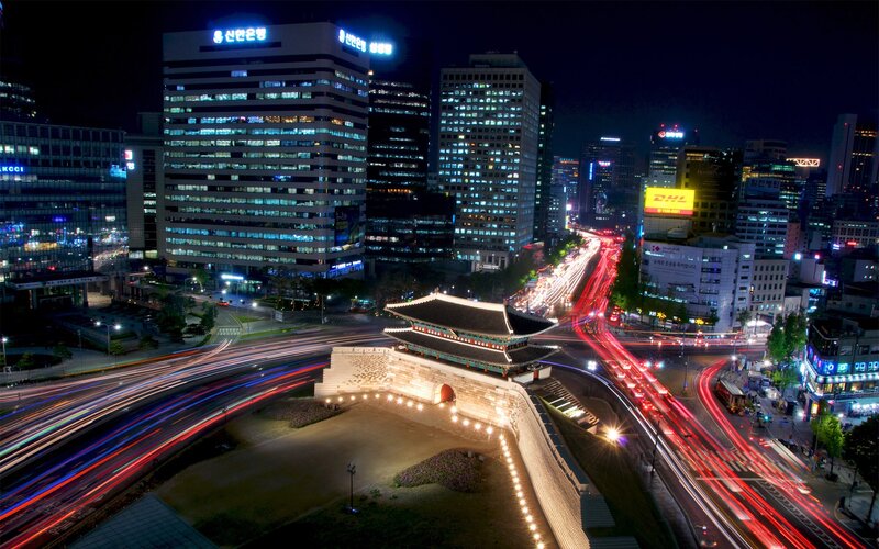 Seoul night cityscape with traditional gate