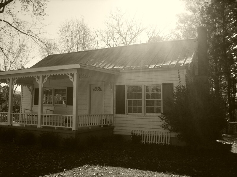Sepia-toned cottage with porch
