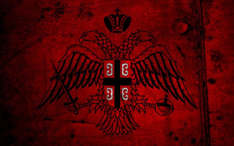 Serbian coat of arms on red background