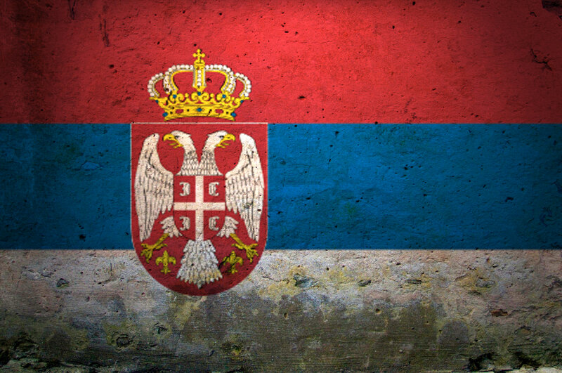 Serbian flag on textured wall