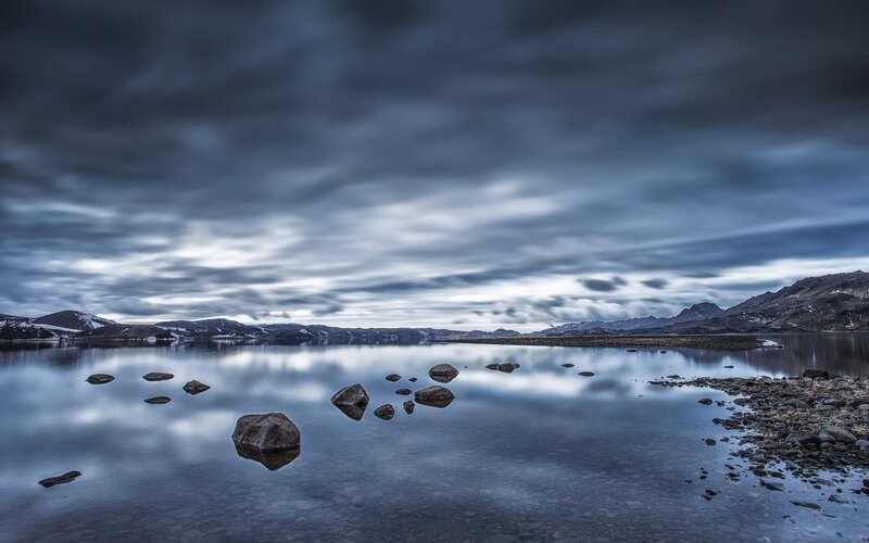 Serene lake with mountain reflection