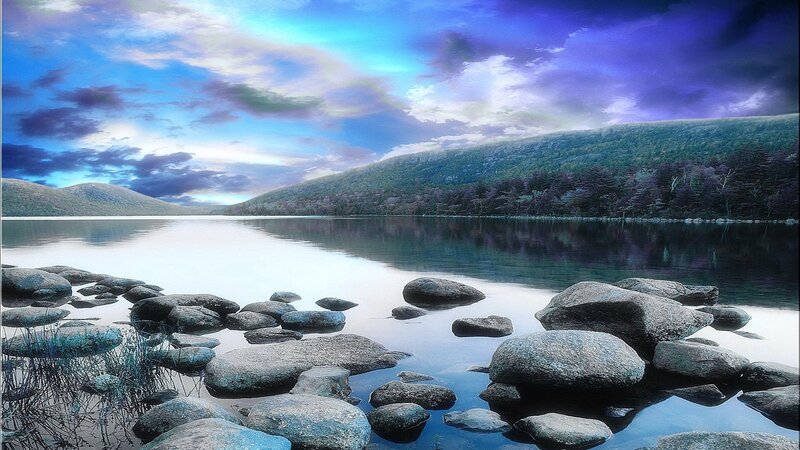 Serene lake with rocky shore