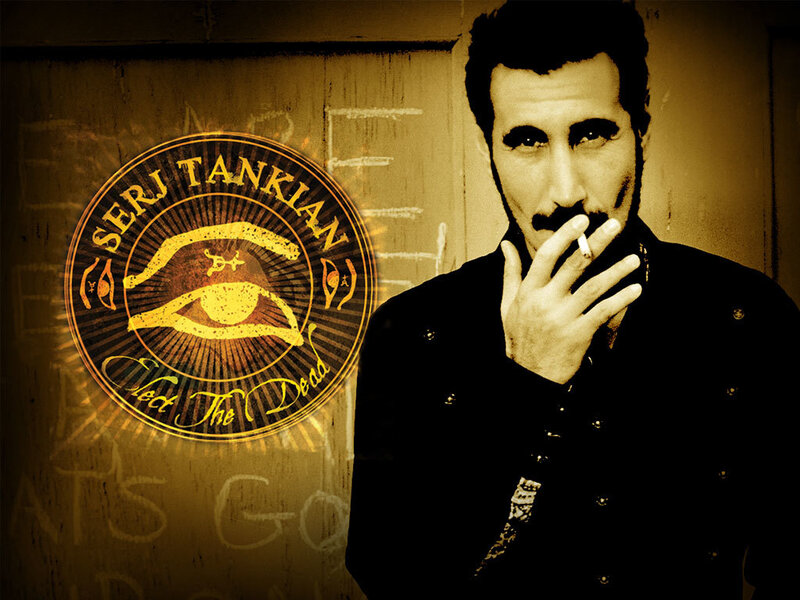 Serj Tankian with album art