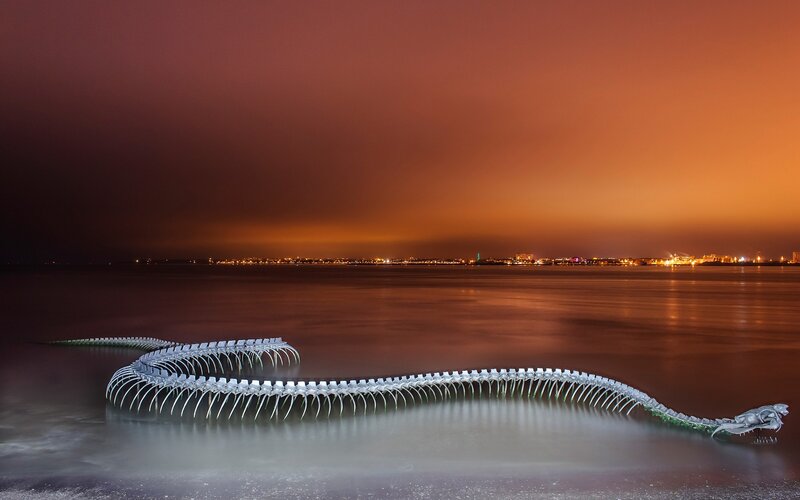 Serpentine skeleton sculpture