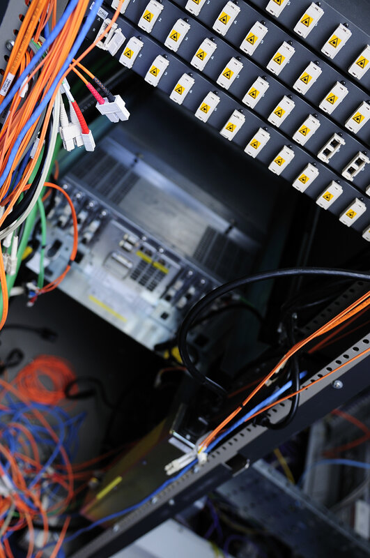 server rack with fiber optic cables