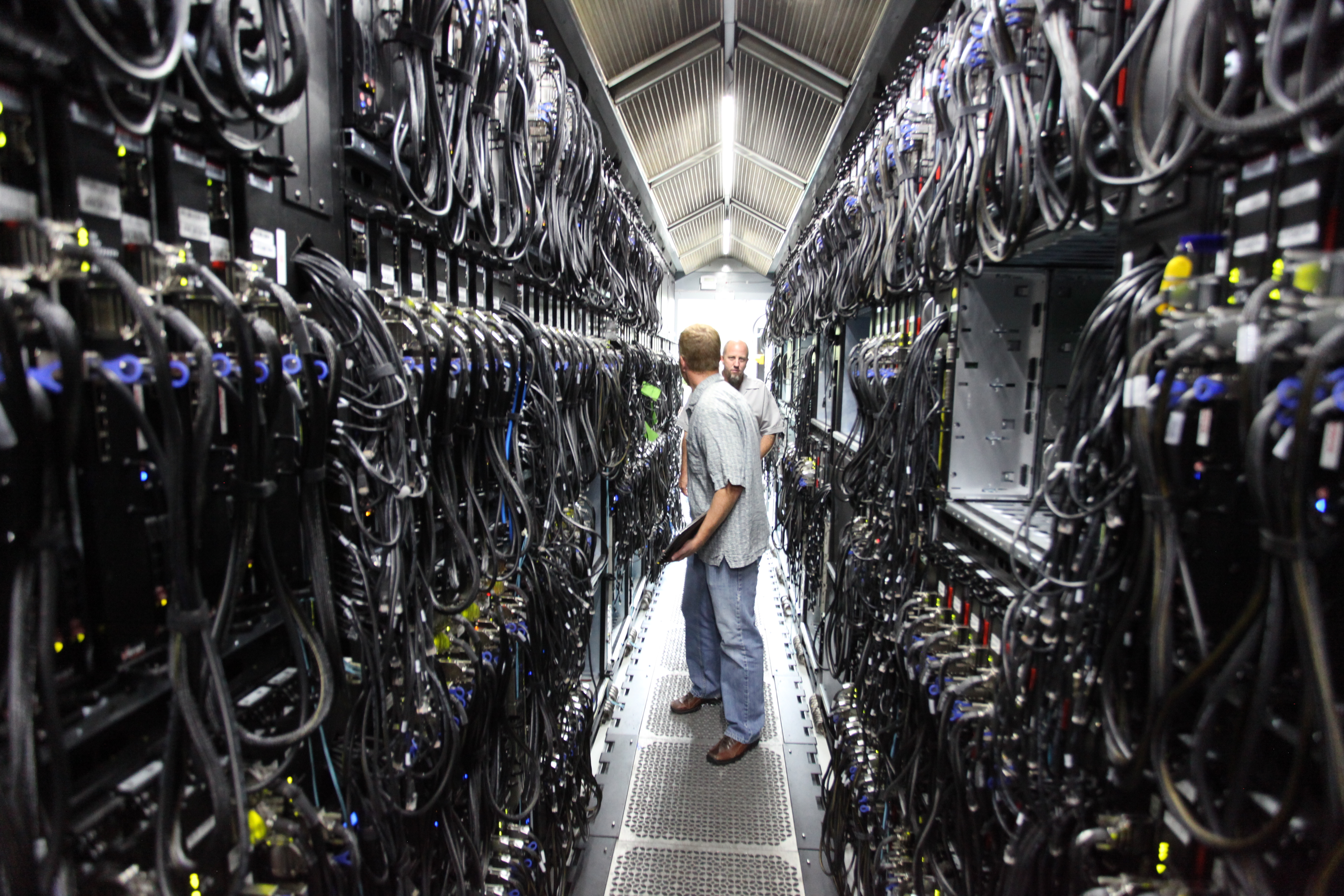 Server room with technicians