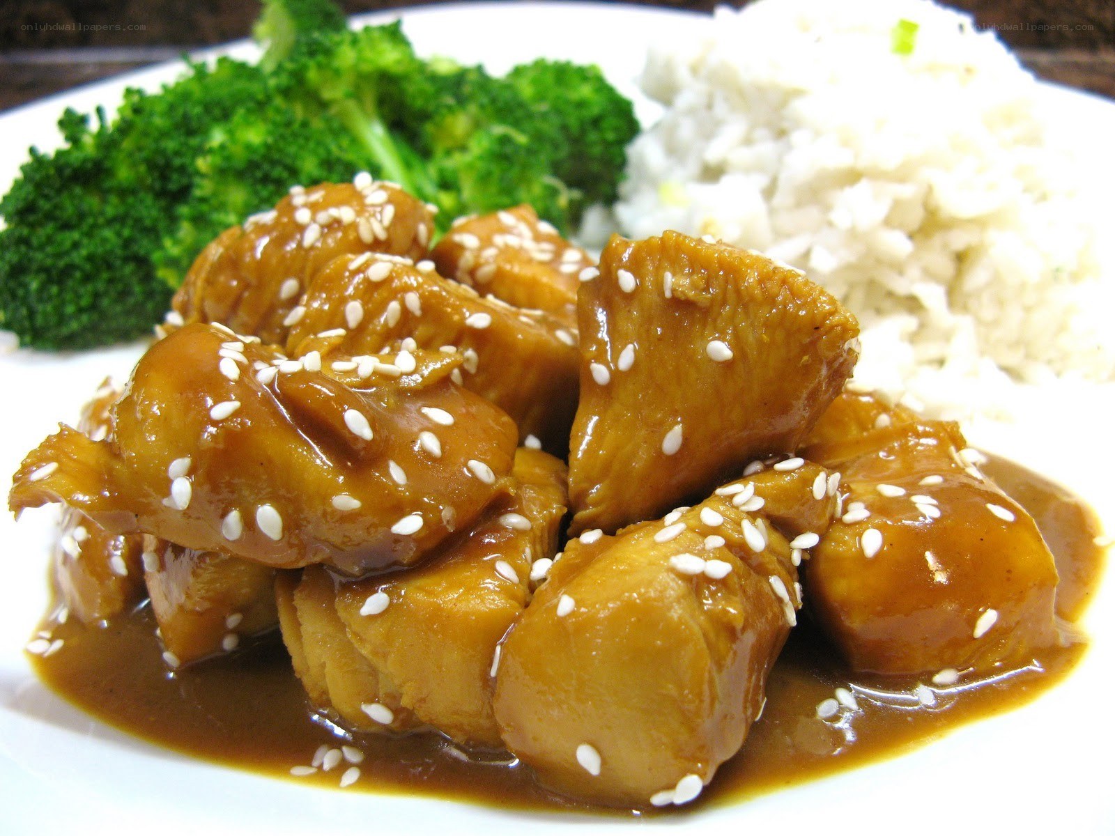 sesame chicken with rice and broccoli