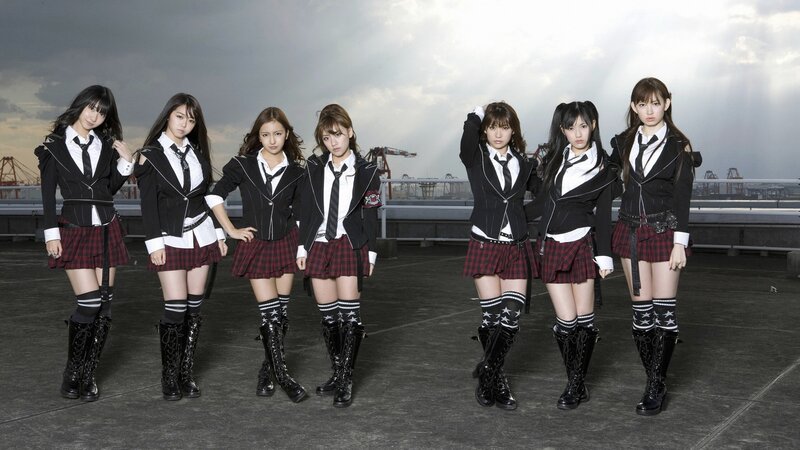 seven girls in school uniforms