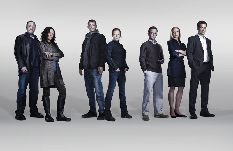 Seven People Standing — Gray