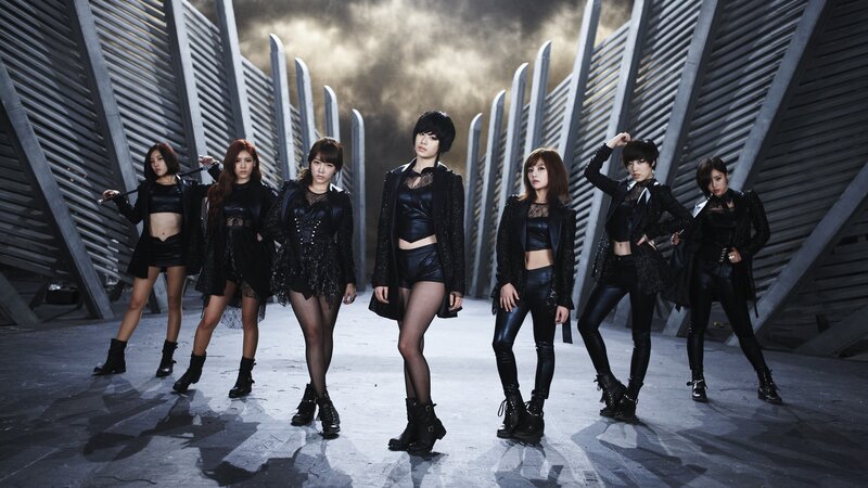 Seven Women in Black Outfits — Dramatic, Photograph, Stage