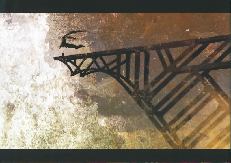 Shadow of a figure on a bridge