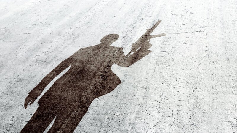 Shadow of Person with Gun — Gray