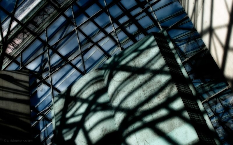 Shadow patterns on a glass ceiling