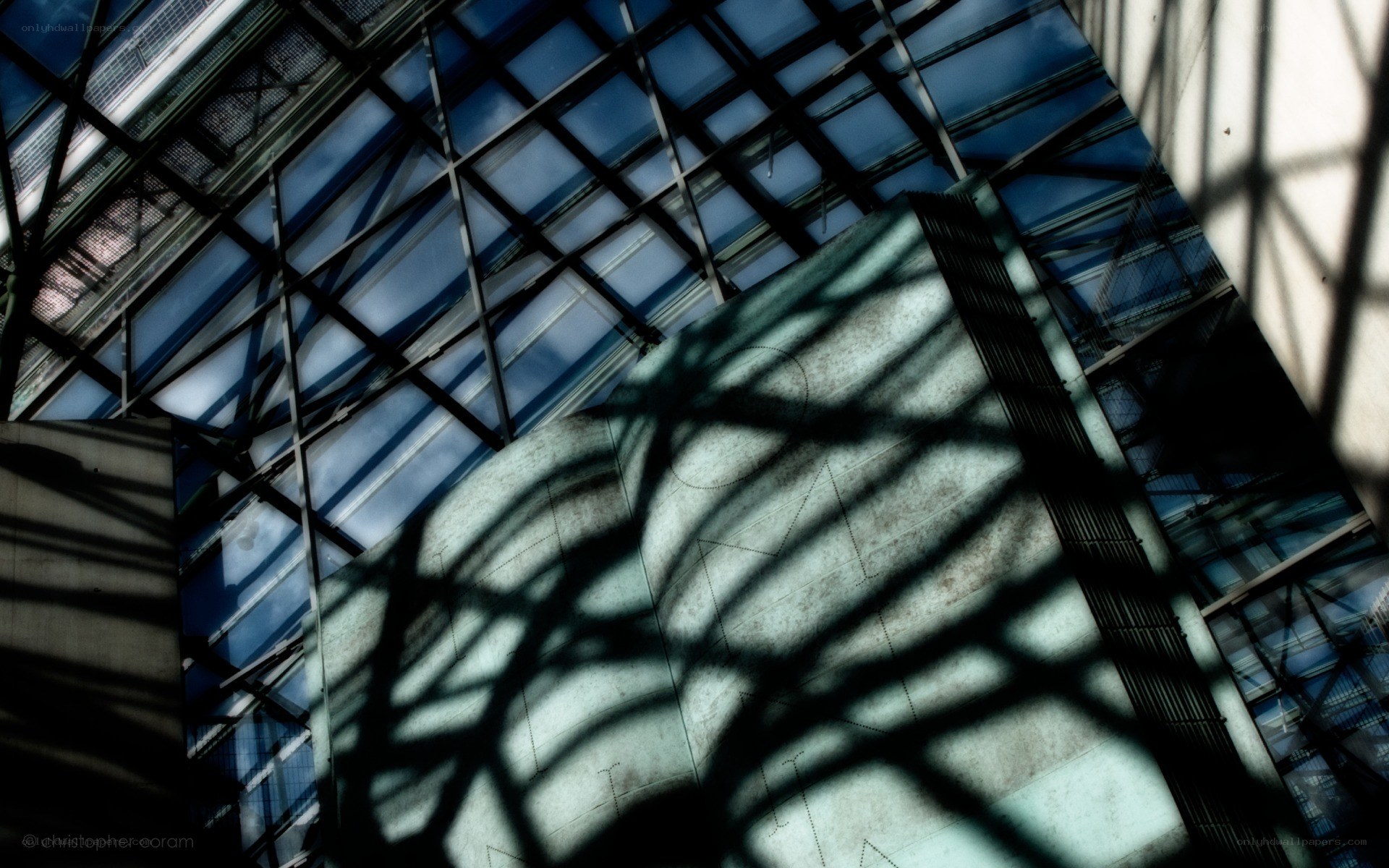 Shadow patterns on a glass ceiling
