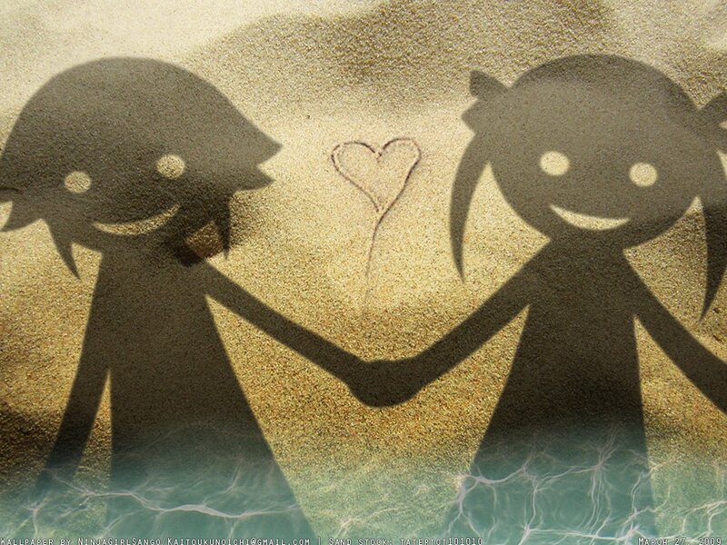 Shadows of love on the beach