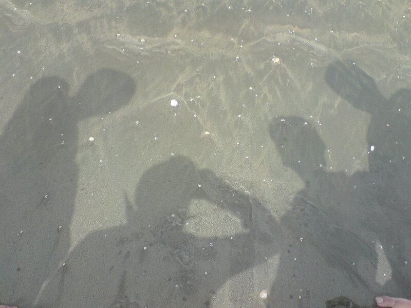 shadows on wet sand