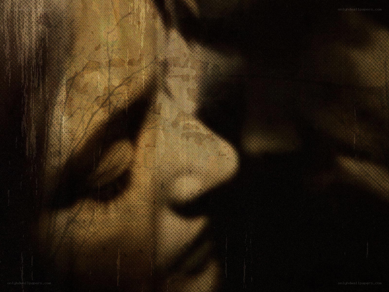 shadowy face in dark tones