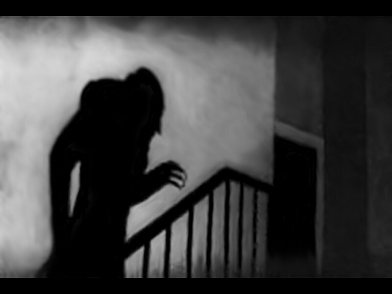 shadowy figure on staircase