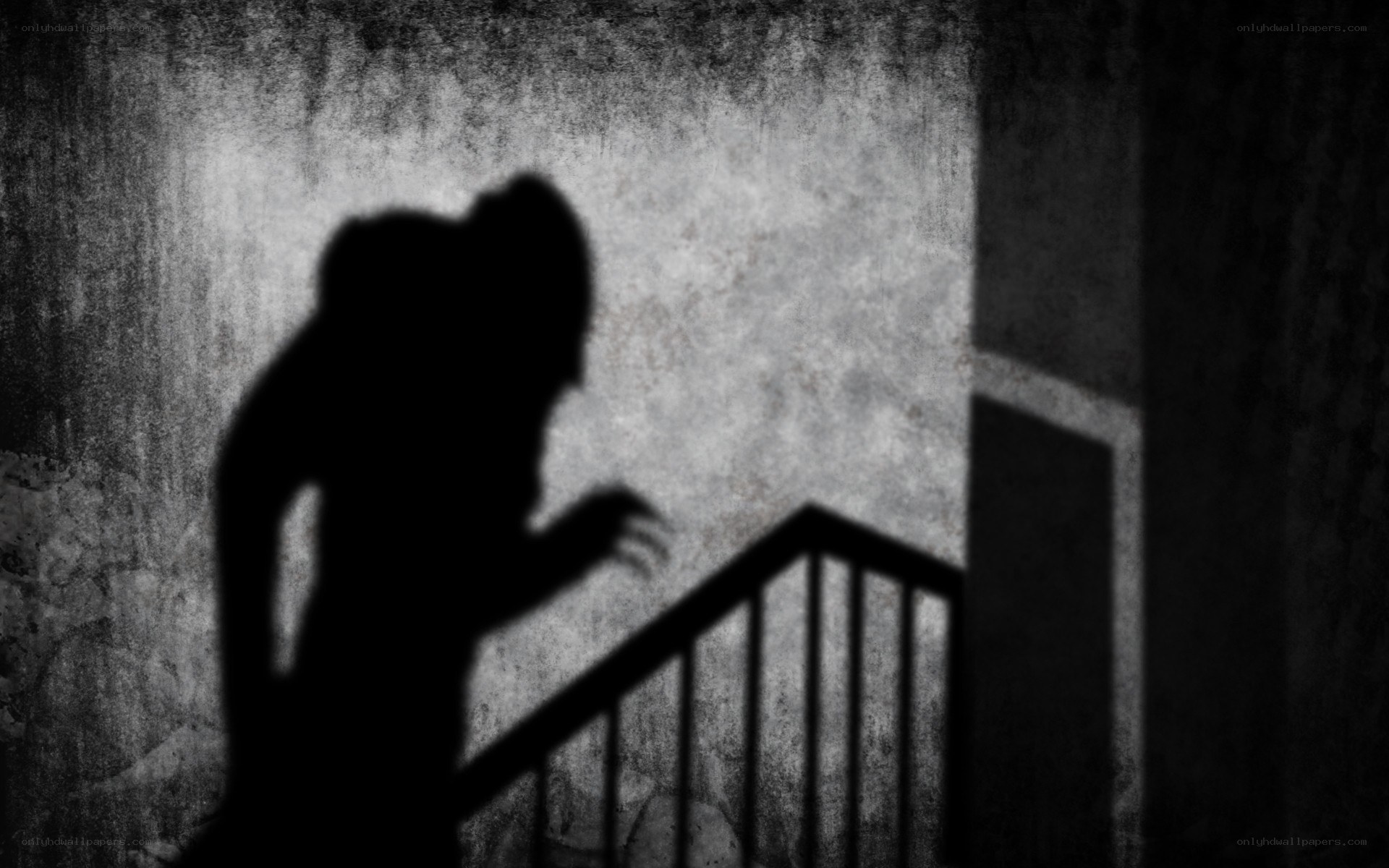 shadowy figure on stairs