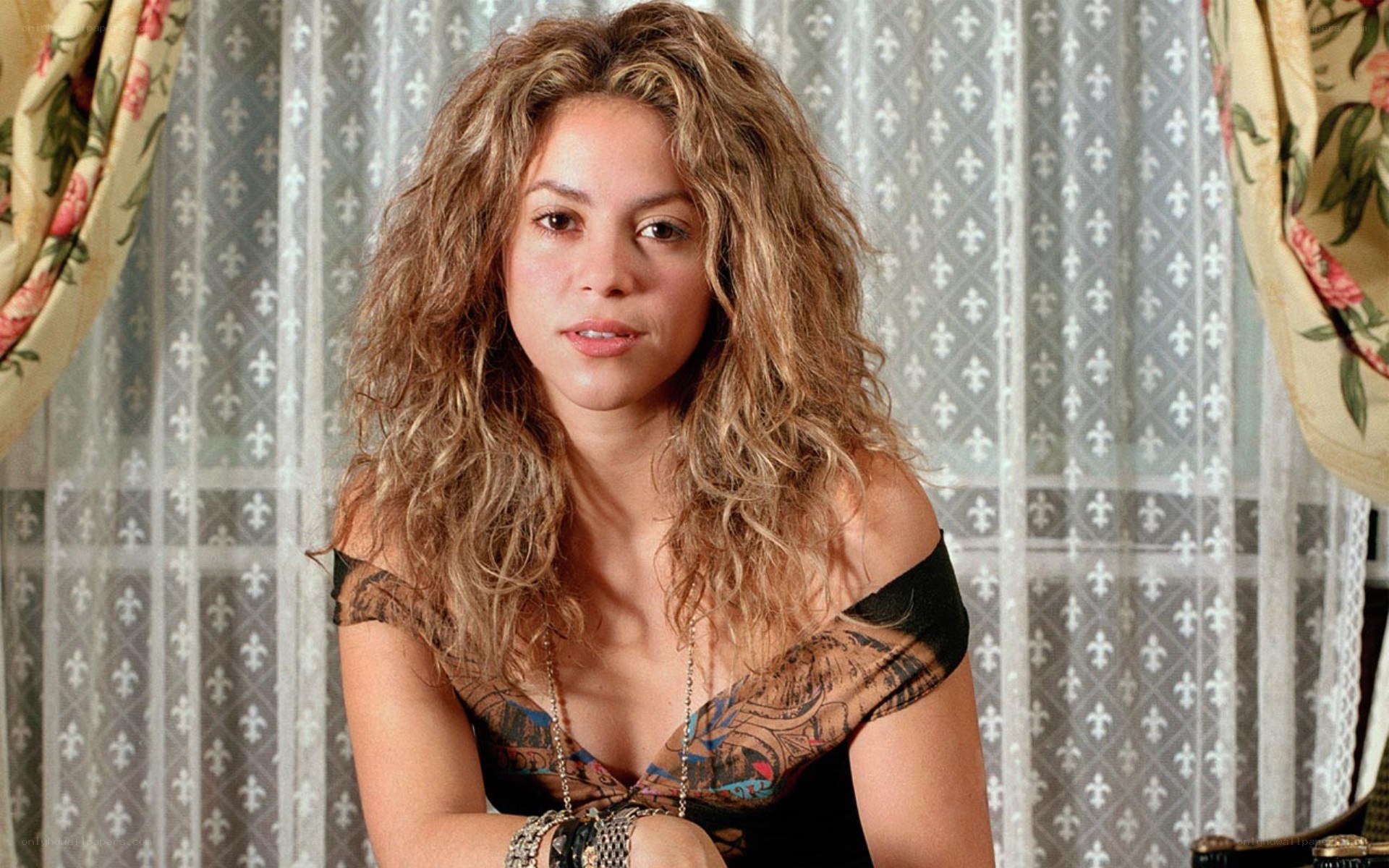Shakira in lace top