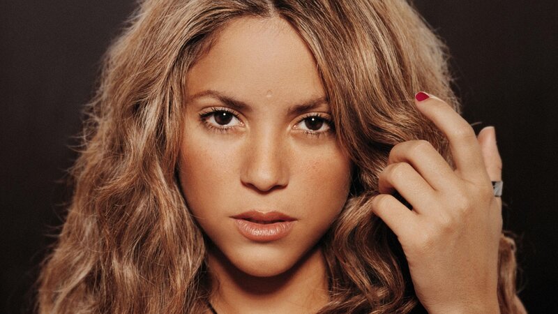 Shakira portrait with hand in hair