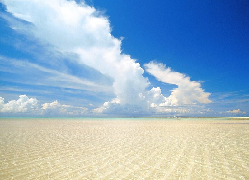 Shallow Beach with Clouds