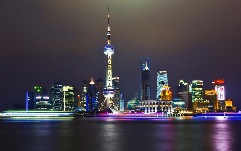 Shanghai Skyline at Night — Black, Dramatic, Photograph, Skyscrapers, River, Boat Lights