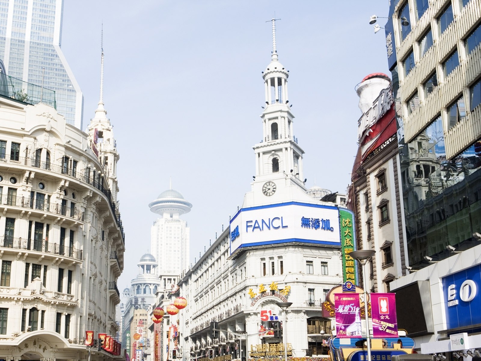 Shanghai street scene with clock tower