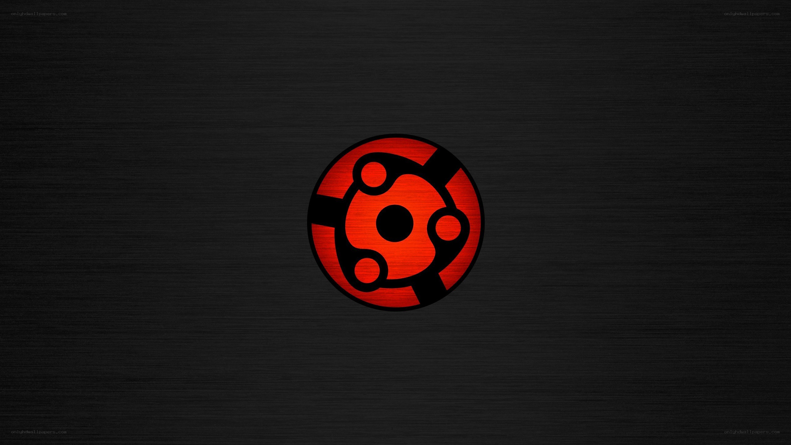 Sharingan symbol on dark background
