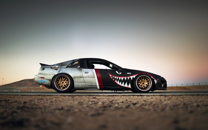 shark-mouth car on racetrack