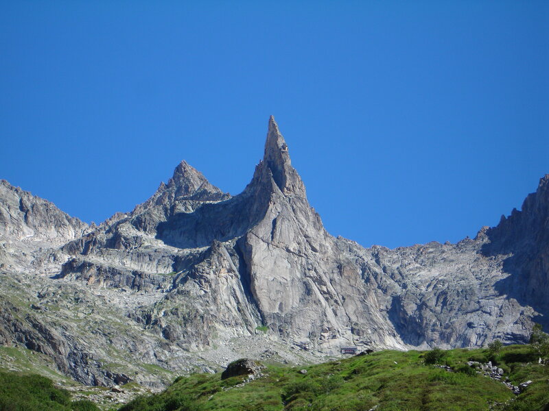 Sharp mountain peak under blue sky