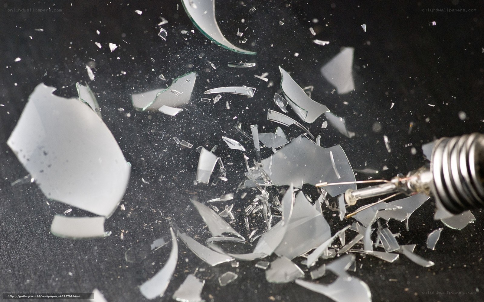 Shattered glass and light bulb