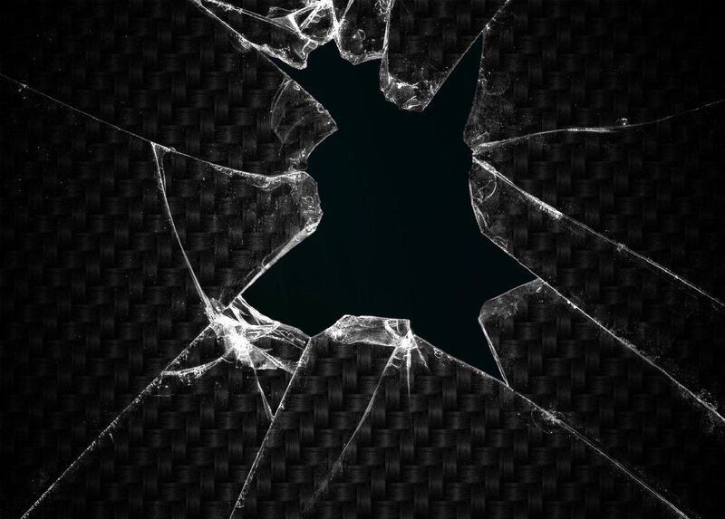 shattered glass on carbon fiber