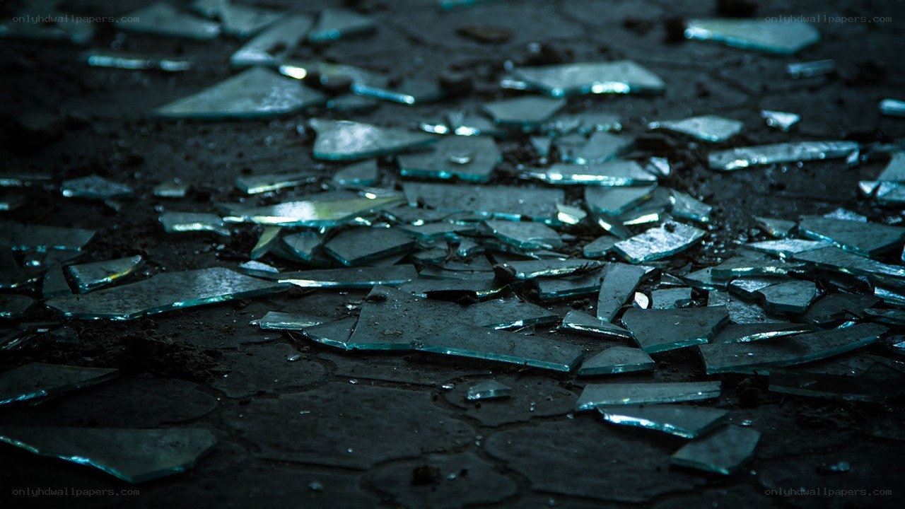 Shattered glass on dark ground
