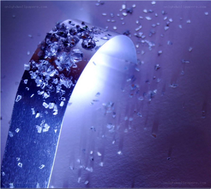 Shattered glass on metal surface
