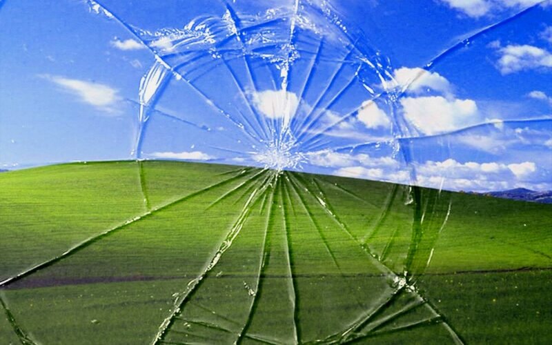 shattered glass over landscape