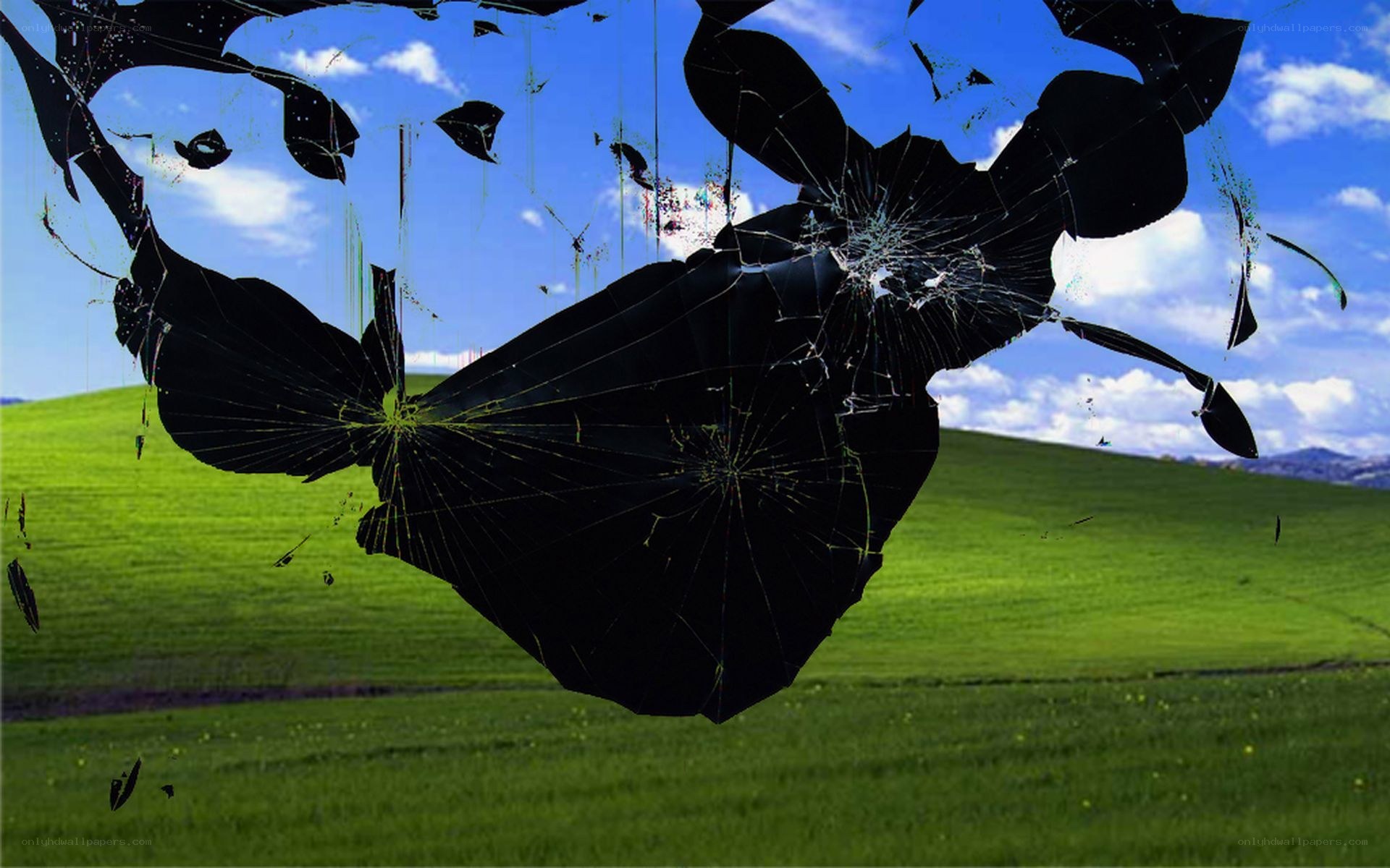 shattered glass over landscape
