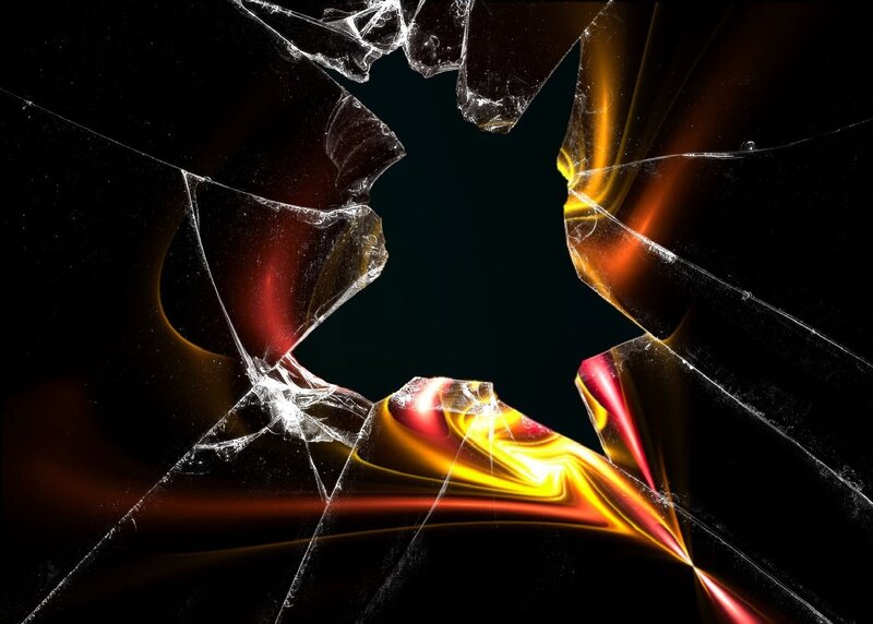 shattered glass with fiery light