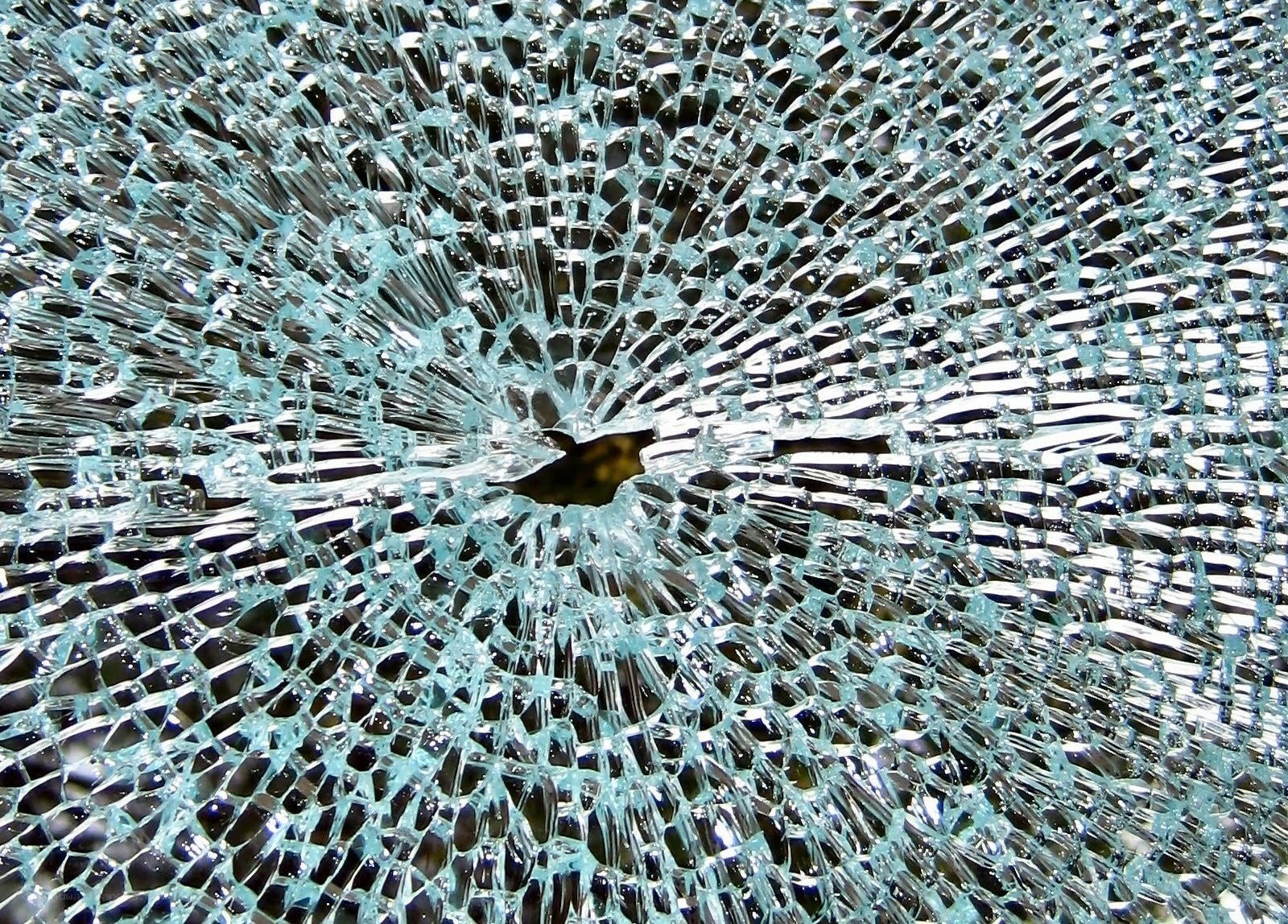 shattered glass with impact point