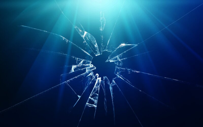 shattered glass with light rays